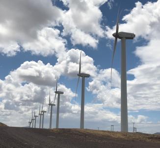 Lake Turkana wind farm project has been the single largest private investment in Kenya ever, reinforcing the country’s status as a safe and reliable investment destination. The project involved the construction and operation of a 310 MW wind power plant, 365 turbines, a 33 kV electricity grid system, and a 33/200 kV substation, as well as civil works, such as the construction of concrete foundation pads, permanent housing for the workers and related utility services. The project also included rehabilitation of approximately 200km of existing road to the wind farm site.

