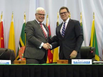 From left to right: EIB Vice-President P. Van Ballekom and CDB President Dr. Wm. W. Smith