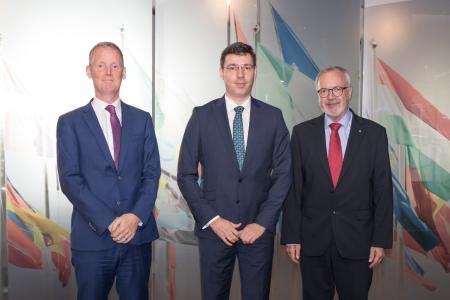 EIB President, Werner Hoyer and EIB Vice-President, Andrew McDowell, welcome Romanian minister, Mr Ionut Misa