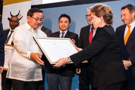 Director General of Credit Rural de Guinee, Mr Lamarana Sadio Diallo accepting the 6th European Microfinance Award from Her Royal Highness the Grand Duchess of Luxembourg