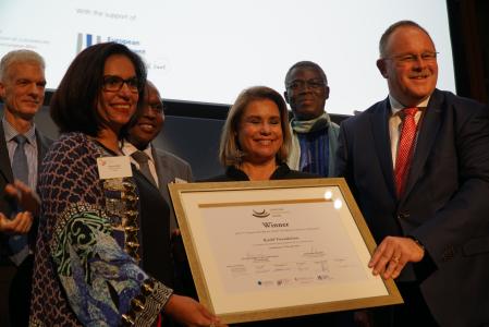 Ms Roshaneh Zafar of Kashf Foundation receiving the award from Her Royal Highness the Grand Duchess of Luxembourg, President of the High Jury, and Mr Romain Schneider, Luxembourg Minister for Development Cooperation and Humanitarian Affairs