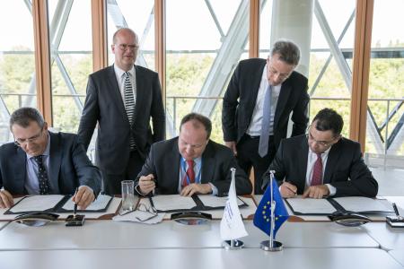 Signature of the Biondvax project. Contingent risk sharing loan for the research and development of a new vaccine against flu pandemic. Signing Vice-President Ambroise Fayolle and Dr. Ron Babecoff, CEO of BiondVax.