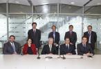 Group photo of the signature - Seated from left to right: Alberto Barragan, Head of Division ALA; Maria Serrano, Advisor to VP Costa; Carlos Da Silva Costa, EIB Vice-President; Carlos Appelgren, Ambassador of Chile in Brussels; Juan Angulo, Advisor to the Embassy of Chile in Brussels. Second row from left to right: Fernardo Torija, Loan officer ALA; Andrew Beikos, Loan officer ALA; Angel Carro, Head of Unit Mercosur, DG External Relarions, European Commission; José María Fernández, Head of Division, Operational Programs & Technical Assistance, Juridical Department