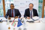 EIB Vice-President Ambroise Fayolle signs the SNIM agreement