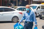 An old Palestinian man wearing protection mask against coronavirus - stock-shot