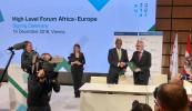 EIB President W. Hoyer and Bandwidth and Cloud Services CEO Y. Maru announcing EUR 15 million new EIB support for to improve communications in East Africa at Africa-Europe High-Level Forum in Vienna